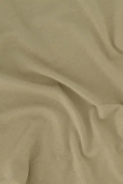 top met schouder detail strik