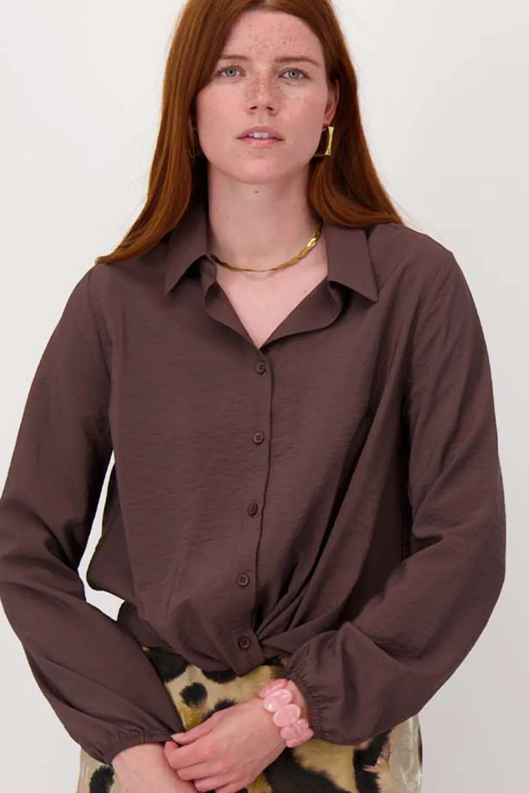 vastgestikte overslag blouse