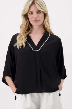 V hals geweven top met zigzag detail